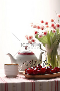一些红樱桃和茶壶