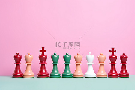棋子背景图片_粉红色墙上的彩色棋子