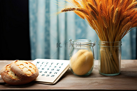 这个桌面景观配有日历和面包