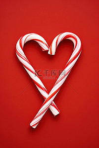 红色背景上拼出一颗带有拐杖糖的心