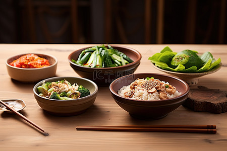 筷子食物背景图片_木顶上放着四碗食物