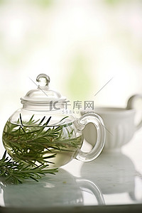 凉茶壶背景图片_桌上茶壶里的迷迭香