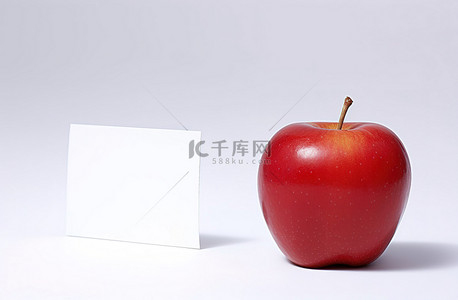 水磨石名片背景图片_红苹果与空白卡