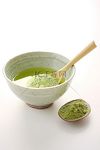 抹茶粉背景图片_白色背景中装满绿色粉末的碗中的绿色抹茶粉