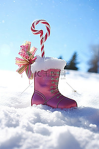 一只小靴子和一张纸坐在雪地里