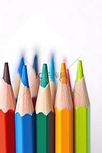 彩色铅笔背景图片_白色背景下排成一排的彩色铅笔