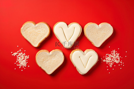 喜报书法字背景图片_红色背景中面包和奶油心的爱心