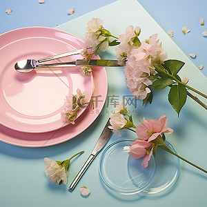 盘子背景图片_粉红色的表面，上面有盘子盘子花和铲子