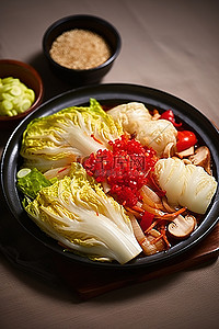 食品辣椒背景图片_蒸白菜辣椒和炒饭放在锅上