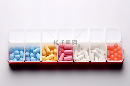 药药丸背景图片_一盒装有彩色药丸的药盒