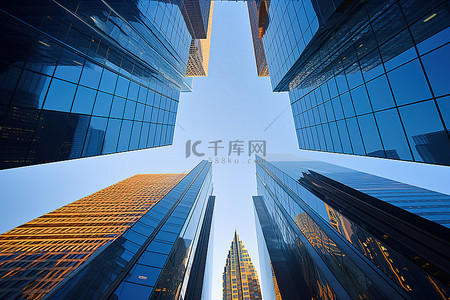 公司业绩图表模板背景图片_在蓝天的衬托下建造高大的玻璃建筑