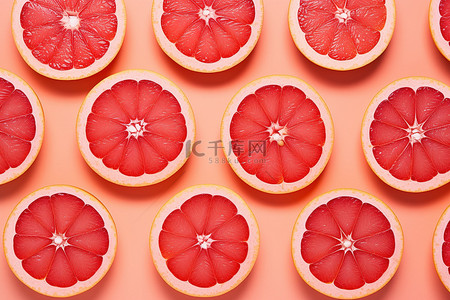 水果柚子背景图片_柚子片被制成亮粉色背景的图案
