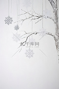 白色背景树枝上挂着的节日雪花