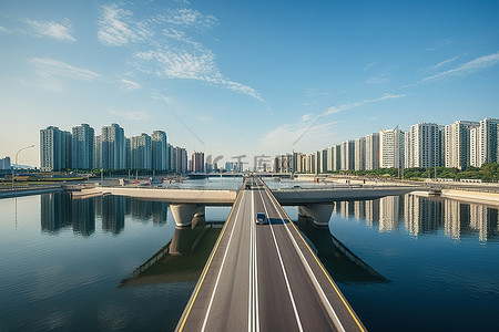 湖上捕鱼背景图片_首尔边境湖上的两条高速公路和建筑物