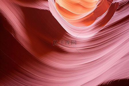 峡谷背景图片_羚羊峡谷的波浪显示在一块大岩石的边缘