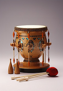 恩格斯诞辰纪念日背景图片_一个木鼓和一组棍子