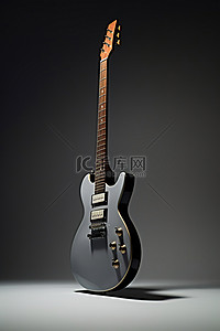 電吉他背景图片_躺在灰色背景上的电吉他