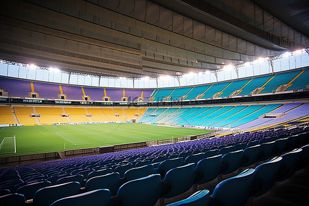 足球场看台背景图片_一个空荡荡的足球场，有蓝色的座位