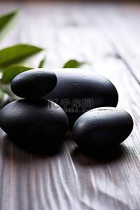 坐在石头背景图片_一群黑色的石头坐在一边