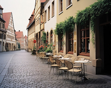 欧洲背景图片_鹅卵石街道上的一些木桌
