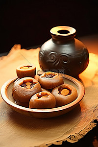 中秋背景图片_水碗里的小蒸面团甜点