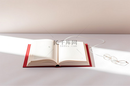 鼠标免抠背景图片_用鼠标在桌子上打开书本