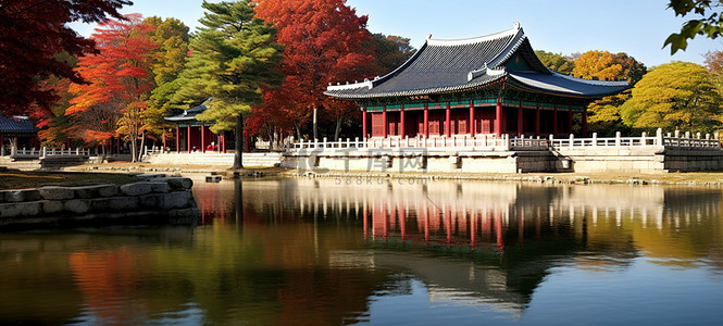 文化传统蓝色背景图片_池塘附近有蓝色树木的建筑