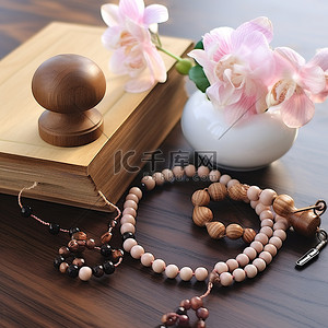 棕色桌子背景图片_四件事佛教茶杯串珠手镯马拉和一朵花