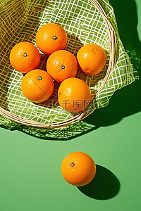 绿色台面和篮子上的新鲜橙子 pxlp01004953