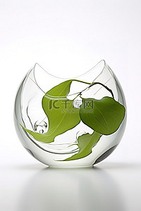 环保背景图片_镶着树叶的玻璃杯