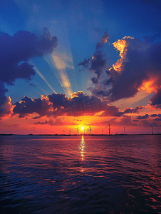 美丽风车摄影照片_美丽夕阳下的风力发电机