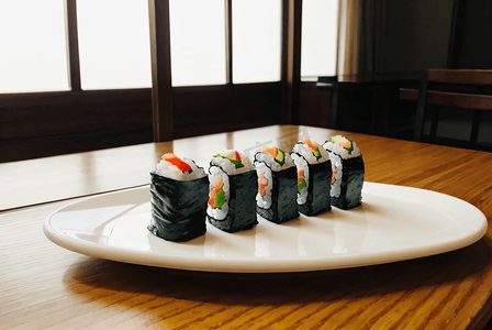 盘子里的三文鱼寿司摄影图片