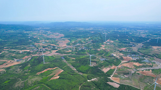 航拍山顶新能源风力发电风轮机