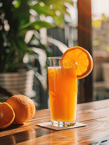美团吃货节摄影照片_餐桌的美食橙汁