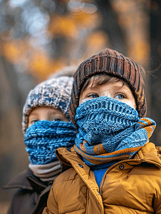 冬季流感摄影照片_秋冬儿童户外戴口罩流感咳嗽