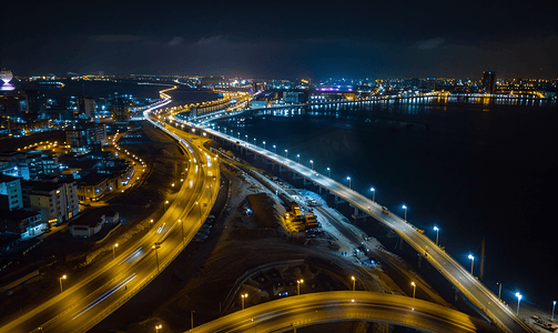 夜景大海摄影照片_跨海大桥建筑车轨夜景城市建设