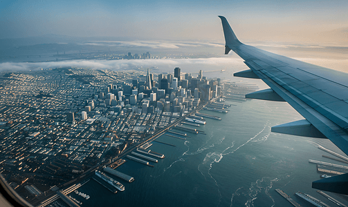 飞机高空摄影照片_飞机上俯瞰城市