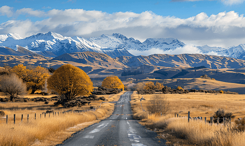 自驾道路摄影照片_雪山下的公路新西兰自驾风光