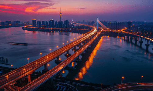 鹦鹉洲摄影照片_夕阳晚霞下的武汉鹦鹉洲大桥夜景