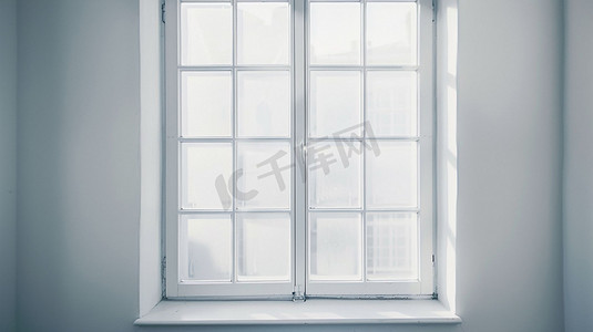 立体窗户摄影照片_白色墙面窗户立体描绘摄影照片
