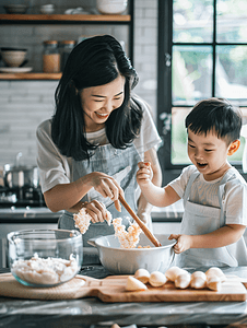 营养膳食摄影照片_亚洲人年轻妈妈和儿子在厨房