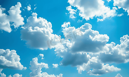 夏天很热的图片摄影照片_蓝天白云天空中的云