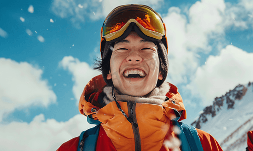 雪摄影照片_亚洲人滑雪的青年男人