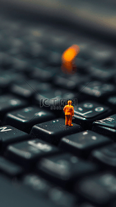 创意劳动节微缩景观键盘上的工人背景图片