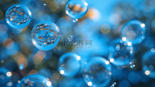 小蓝色梦幻背景图片_蓝色夏季蓝天中漂浮的气泡背景