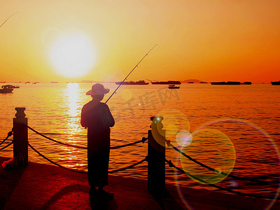 城市风光摄影照片_海南三亚湾的夕阳西下