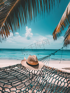 沙滩吊床草帽夏天旅游图片