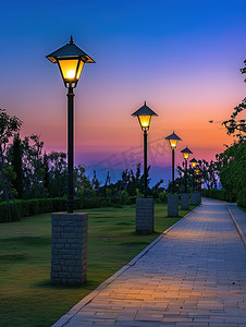 黄昏的天空公园路灯高清摄影图