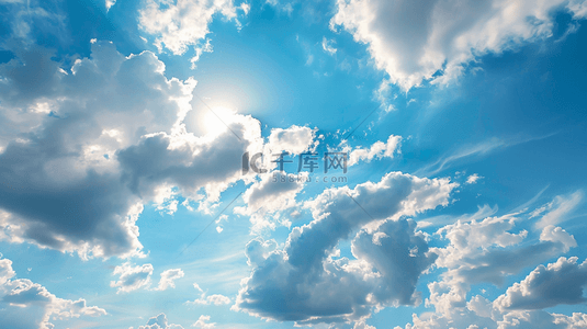 明媚的阳光背景图片_阳光明媚照射下蓝天白云风景的背景