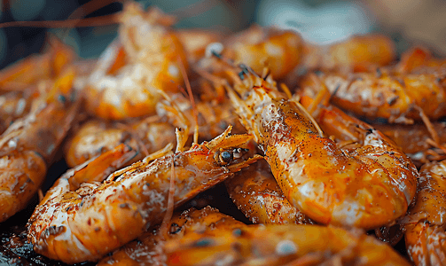 吃葡萄摄影照片_牙买加风味的烤虾或烤虾